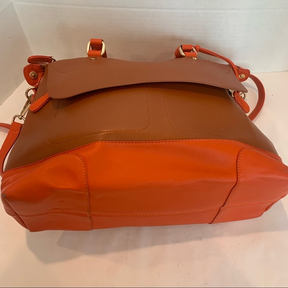 Orange handbag with a rust color body of bag and orange accent shoulder strap - Picture 12 of 16